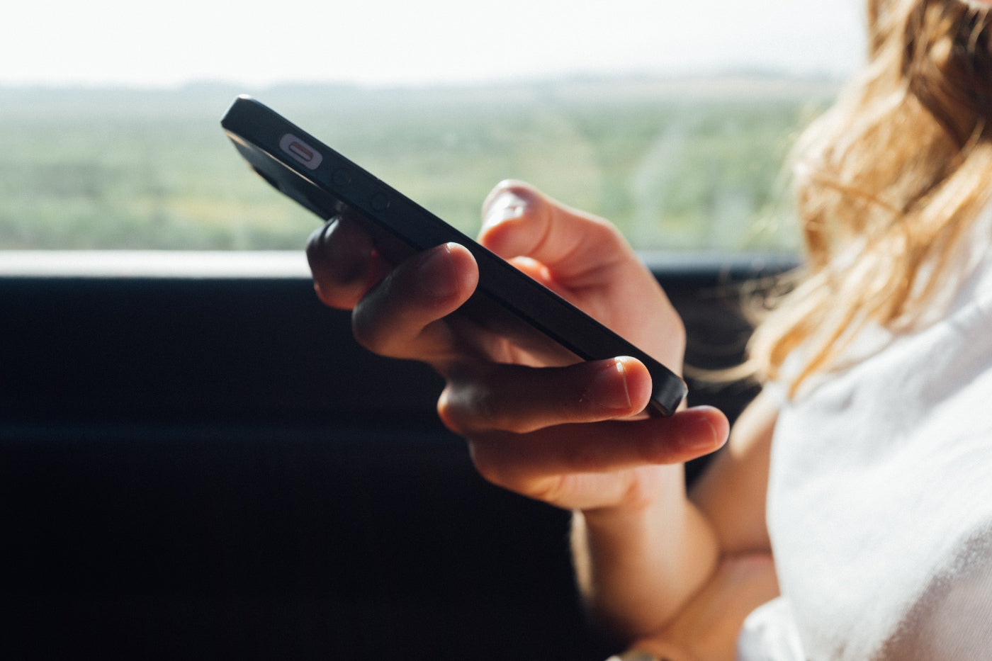Woman playing with her phone