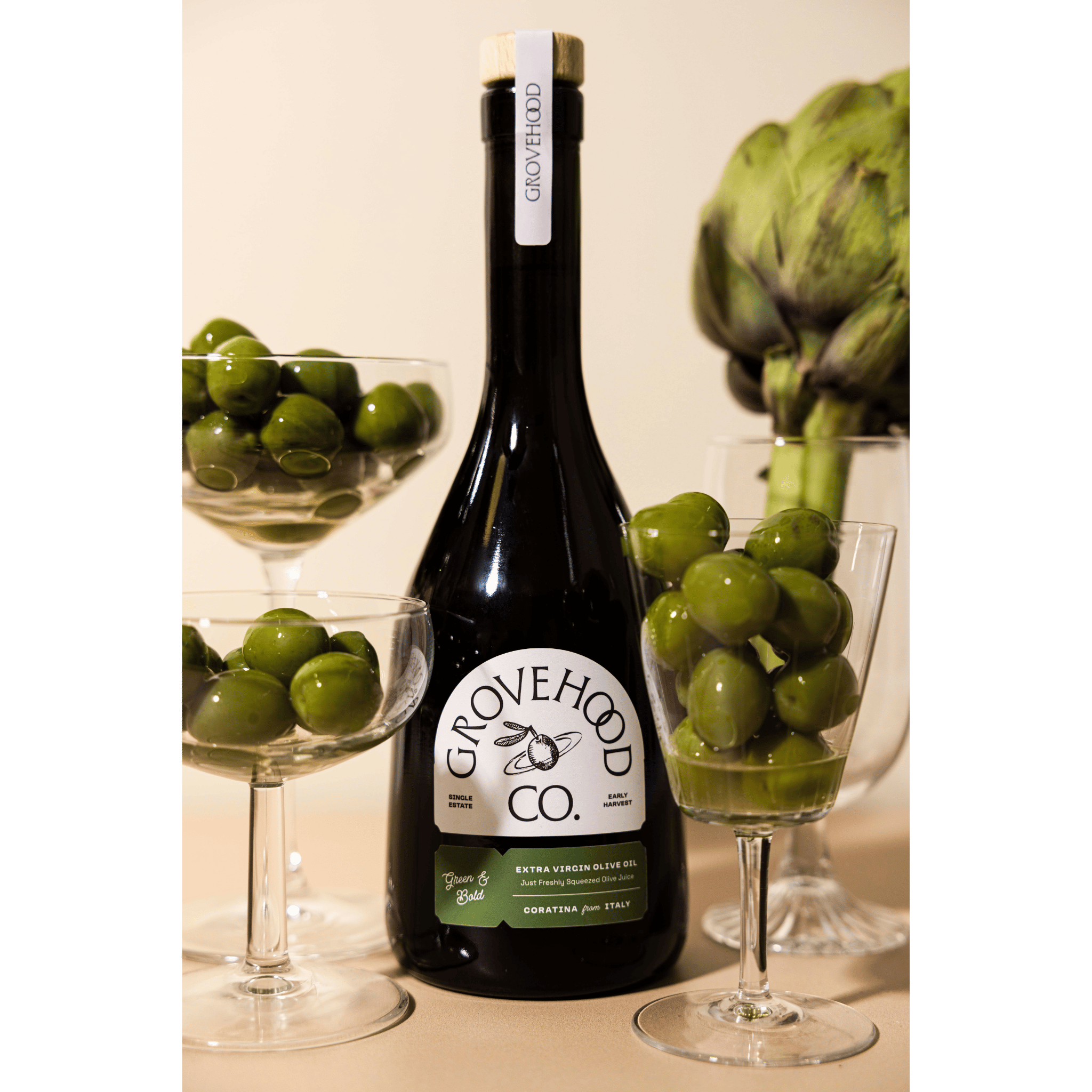 Grovehood Collective Italian extra virgin olive oil bottle with green olives